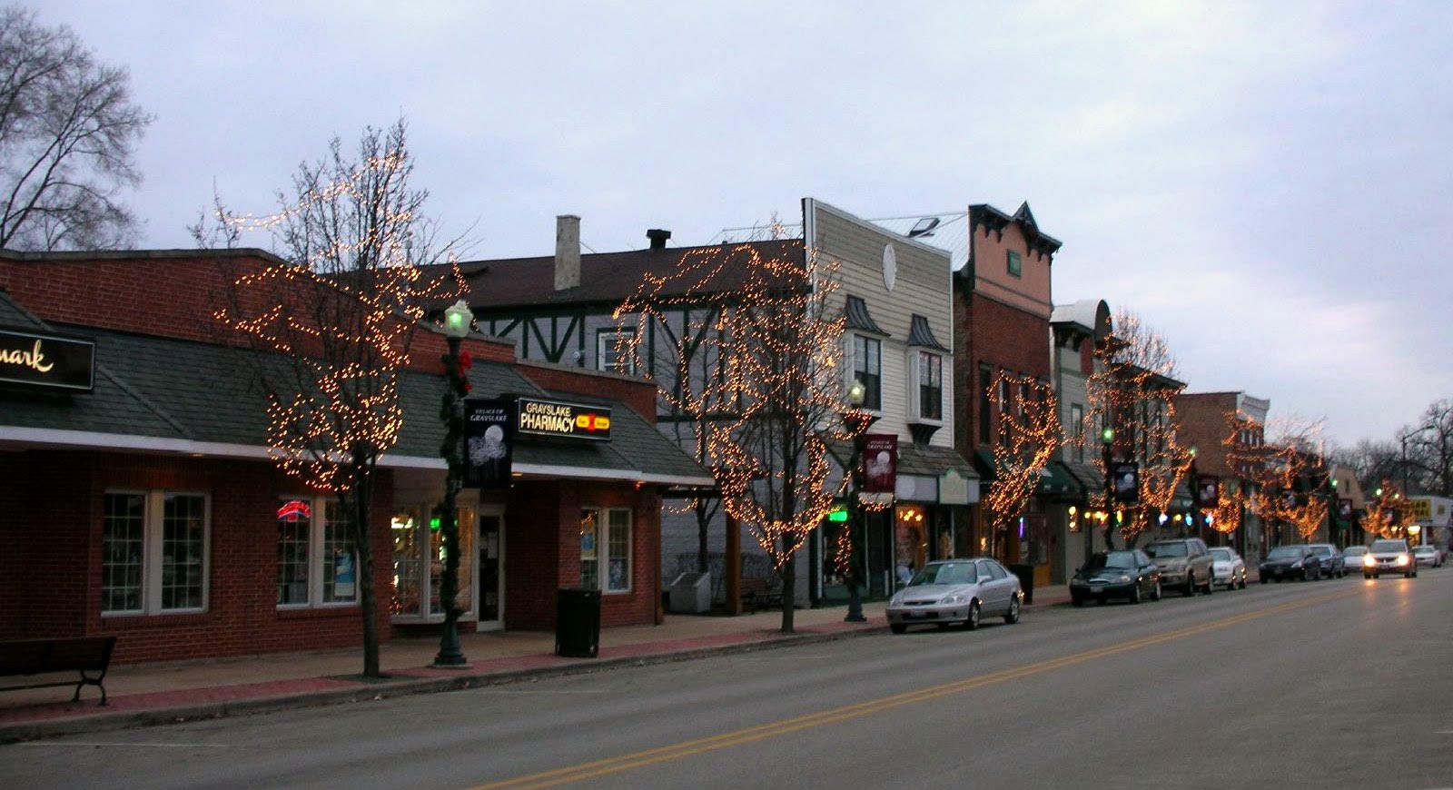 Downtown Grayslake, Illinois storefronts lit with holiday lights